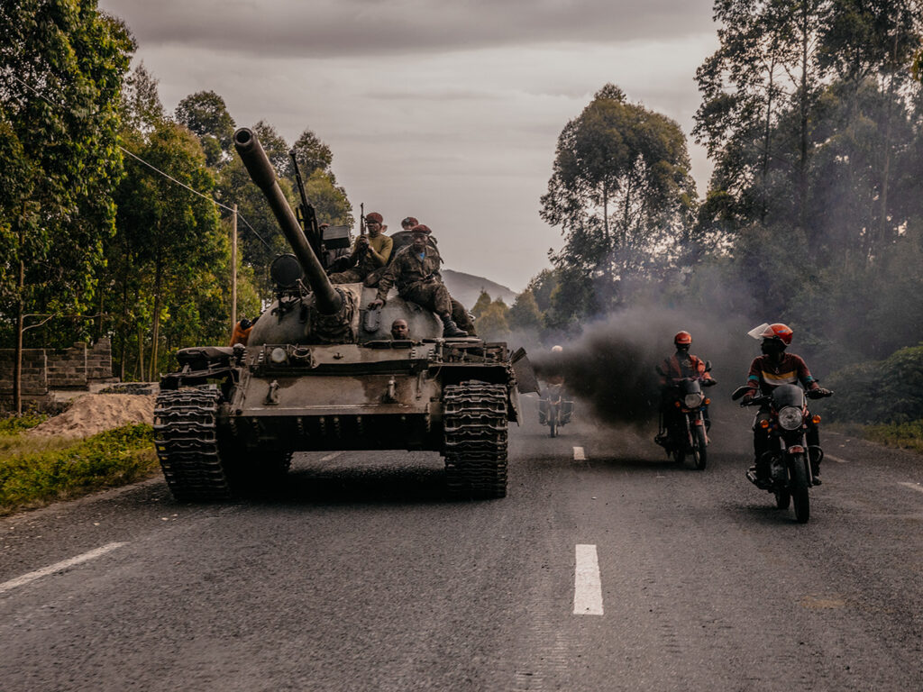 Tanks with motorcycle outriders.